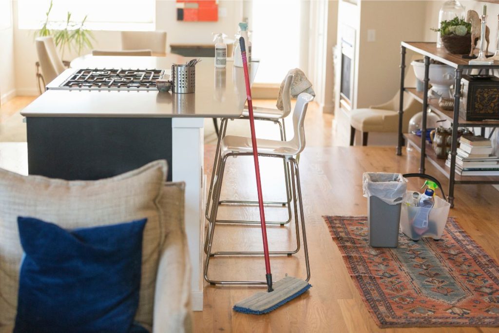 tidy home with cleaning supplies